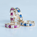 Geelgouden oorringen met Zirkonia en Blauwe kristal