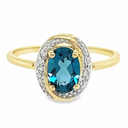 Bicolor gouden ring met London Blue Topaas en Diamant